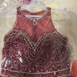 Party dress. Burgundy color. Never used, brand new.